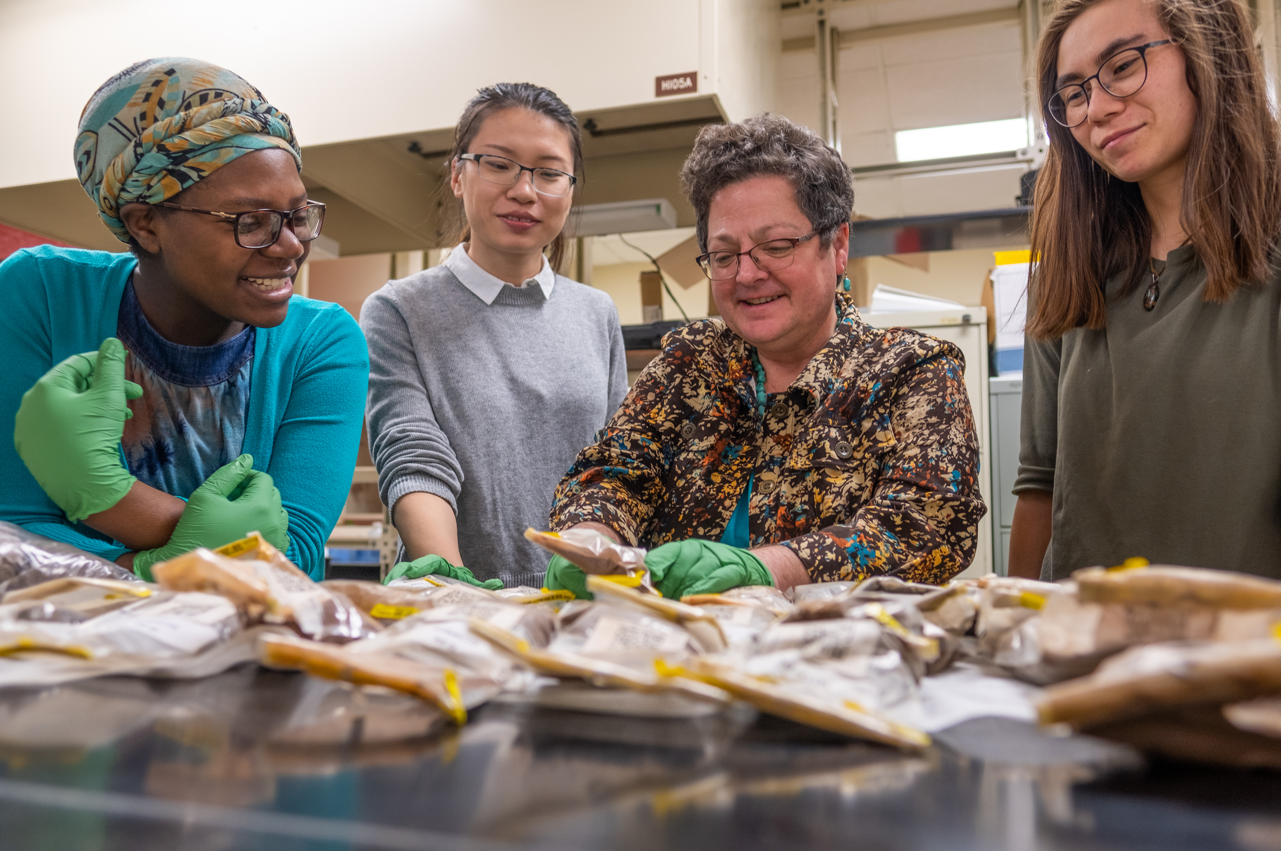 Doctor Snapp in soils lab with students